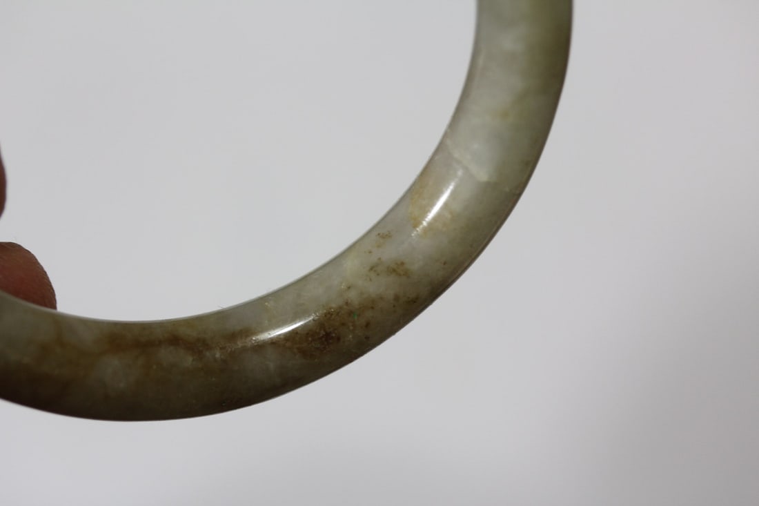 A Nephrite Jade Russett Bangle Bracelet - 7