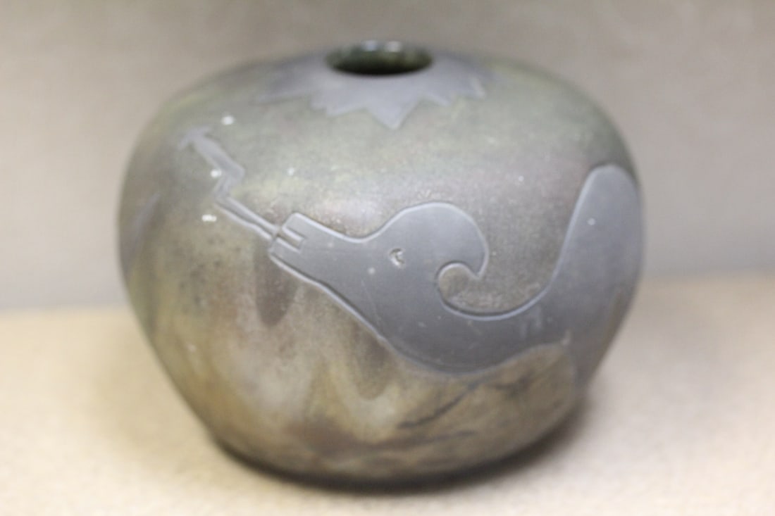 Animated pottery: Signed K. Irish, probably a studio piece, 4 1/4" tall