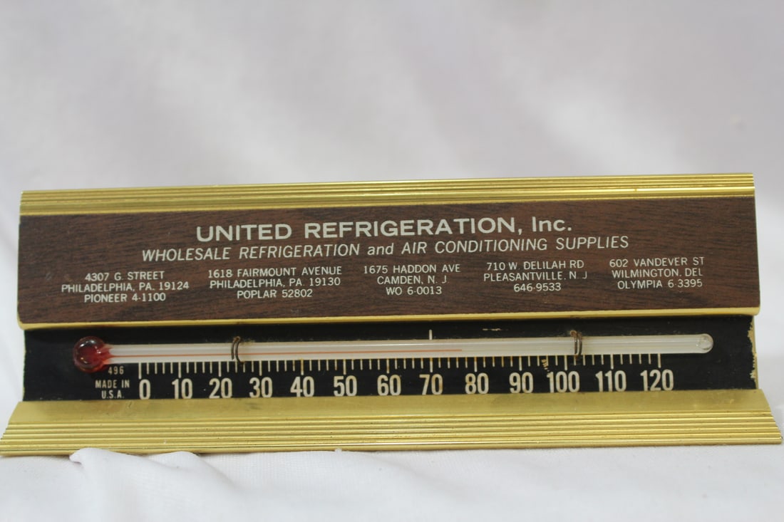 A United Refrigeration Inc. Thermometer: 5 3/4" in length