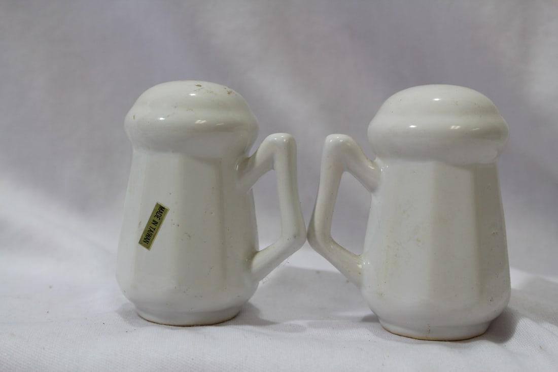 A Pair of Salt and Pepper Shakers - 3