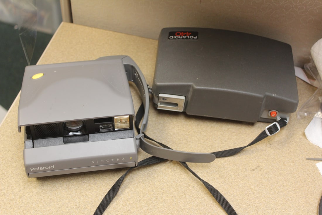Lot of 2 Polaroid Cameras: not tested to see if works or not