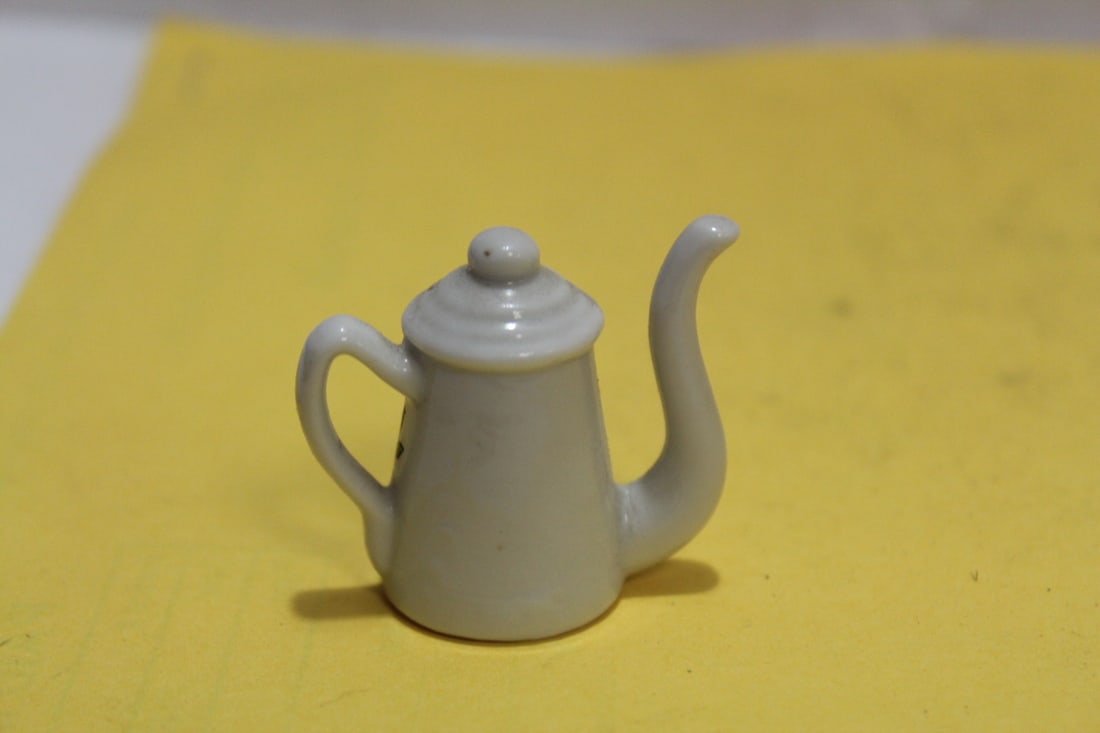 A Miniature Ceramic Teapot - 2