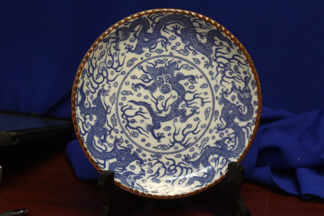 Antique Chinese/Asian Blue and White Dragon Plate: 19th century - please note: one chip on the back - 7 1/4" in diameter