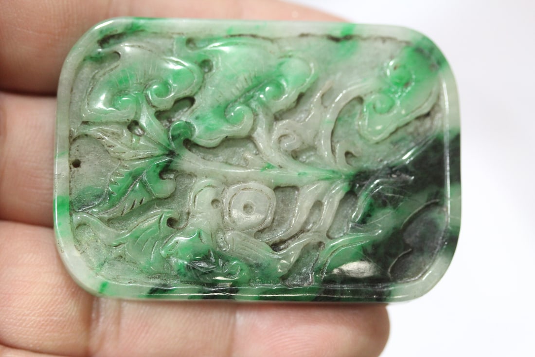 A Chinese Green Jade or Jadeite Pendant: 2 3/8" x 1 5/8"