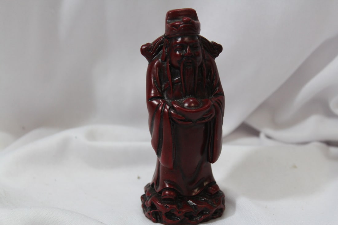 A Chinese Resin Figurine: 4" tall