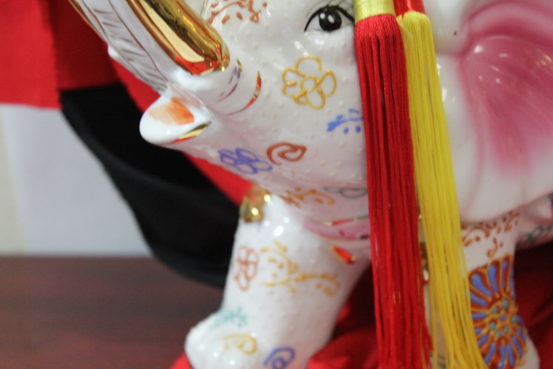 A Boy and Girl on Elephant Statues - 4