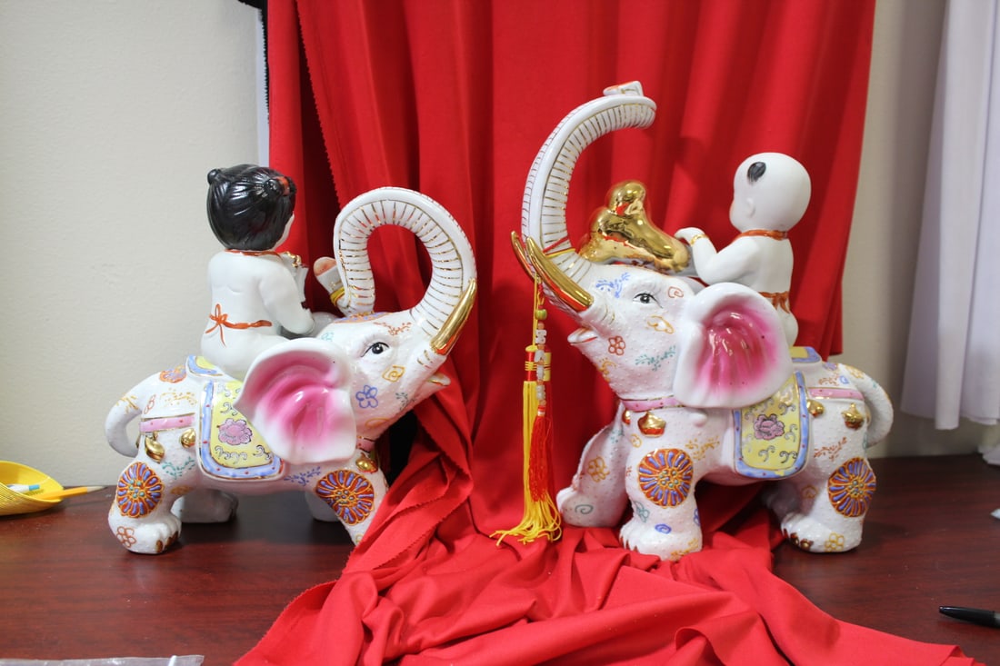 A Boy and Girl on Elephant Statues - 8