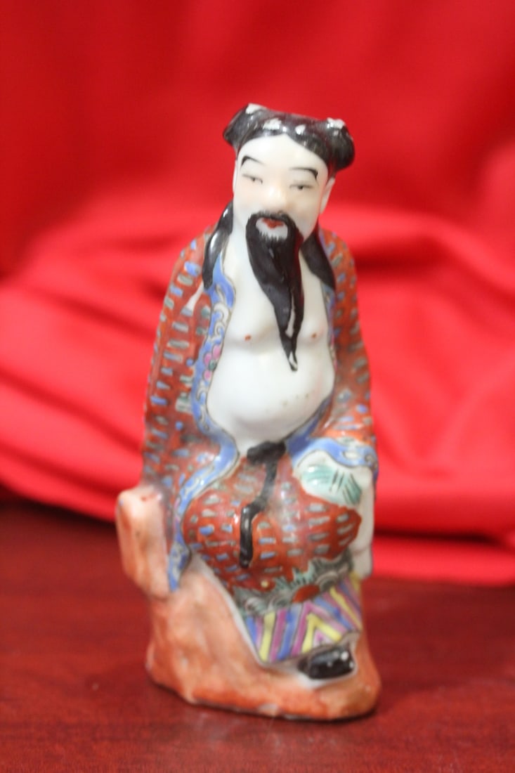 An Antique Chinese Porcelain Figurine: worn - 4 3/4" tall