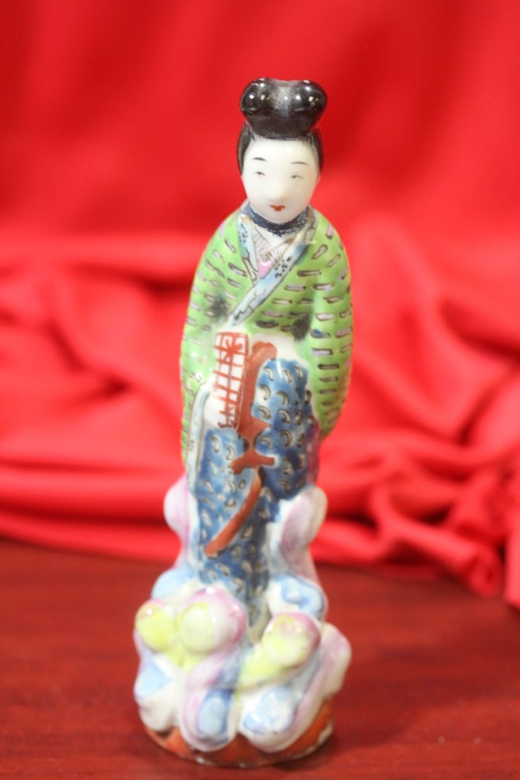 An Antique Chinese Porcelain Figurine: artist signed - marked "China" - 6" tall