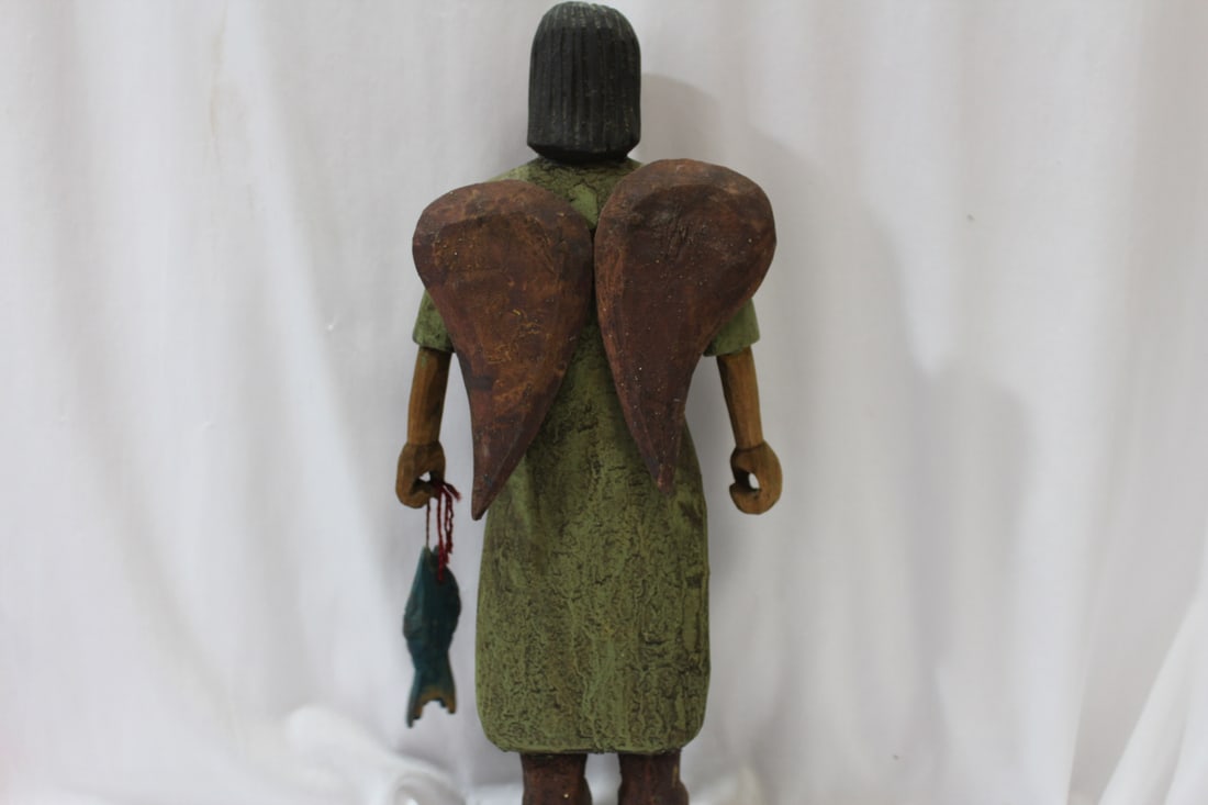 A Wooden Figurine - 8