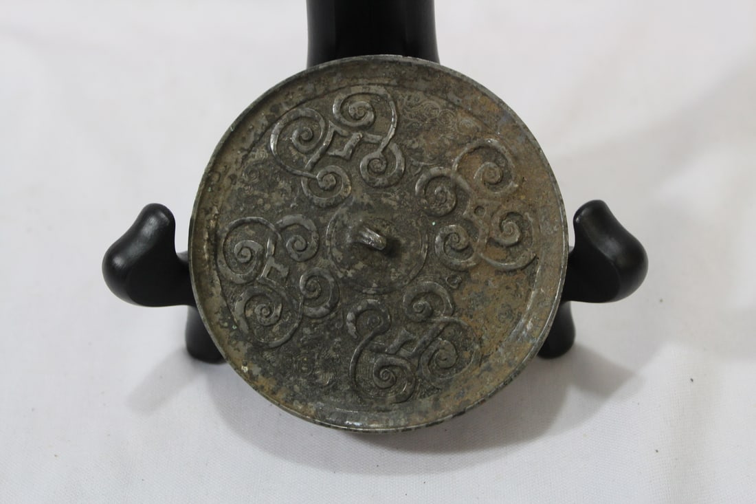An Antique/Vintage Chinese Bronze Mirror: 3 1/4" in diameter - exact age unknown