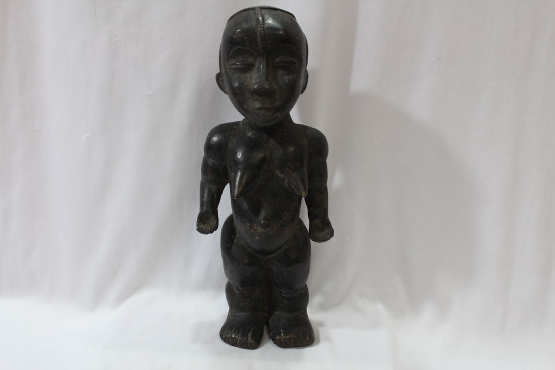 An Antique Cast Iron African Statue: heavy - black memorabilia - 12 1/2" tall