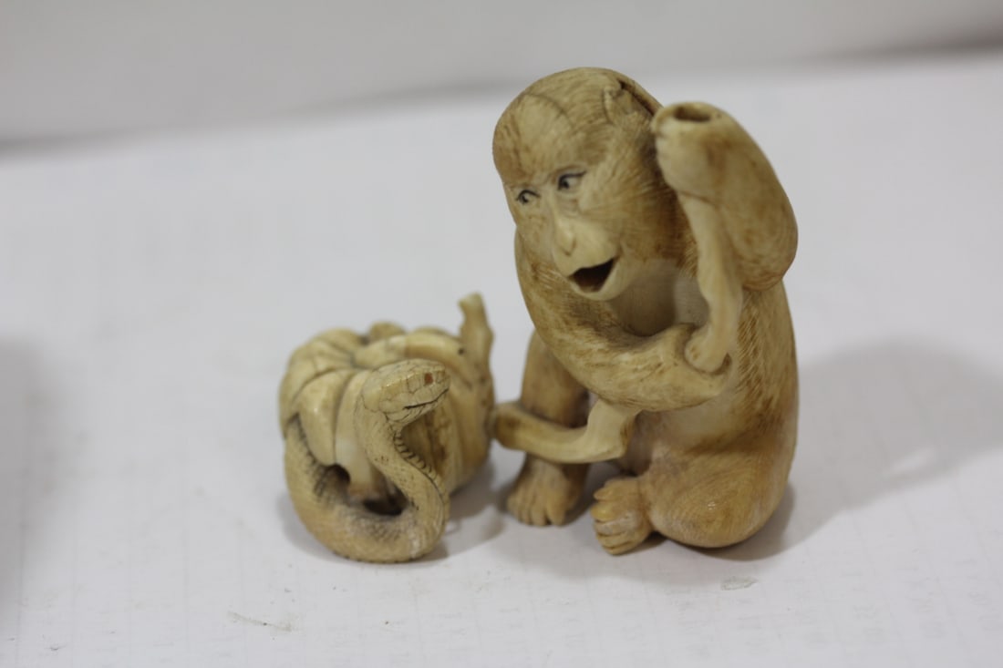 An Intricated Carved Bone Japanese Okimono - 2