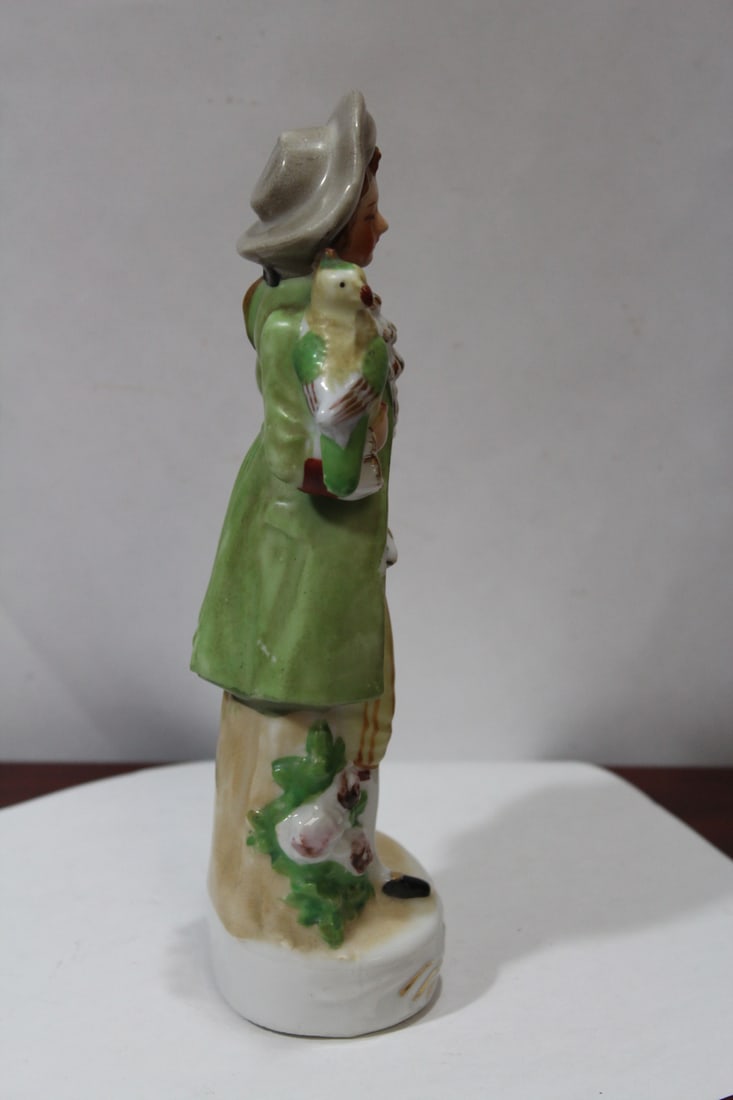 A Japanese Ceramic Figurine - 4