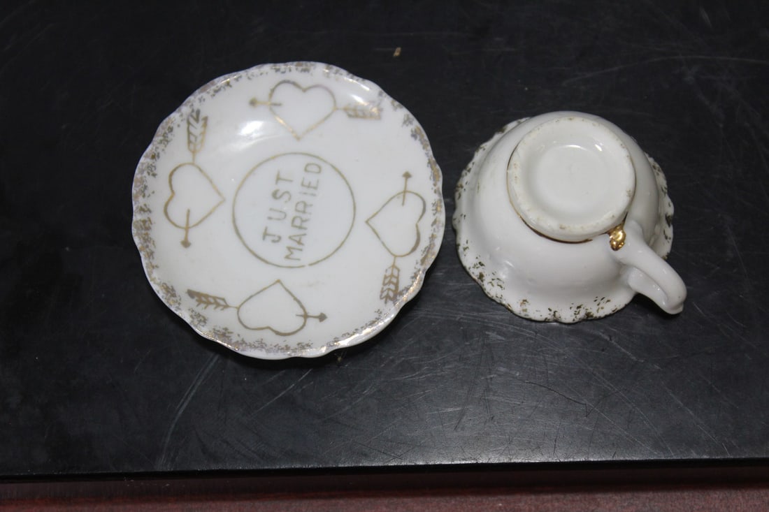 A Miniature Ceramic Cup and Saucer - 2