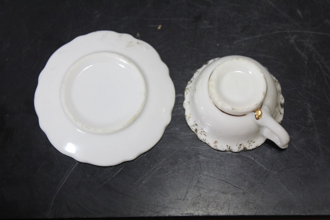 A Miniature Ceramic Cup and Saucer - 3