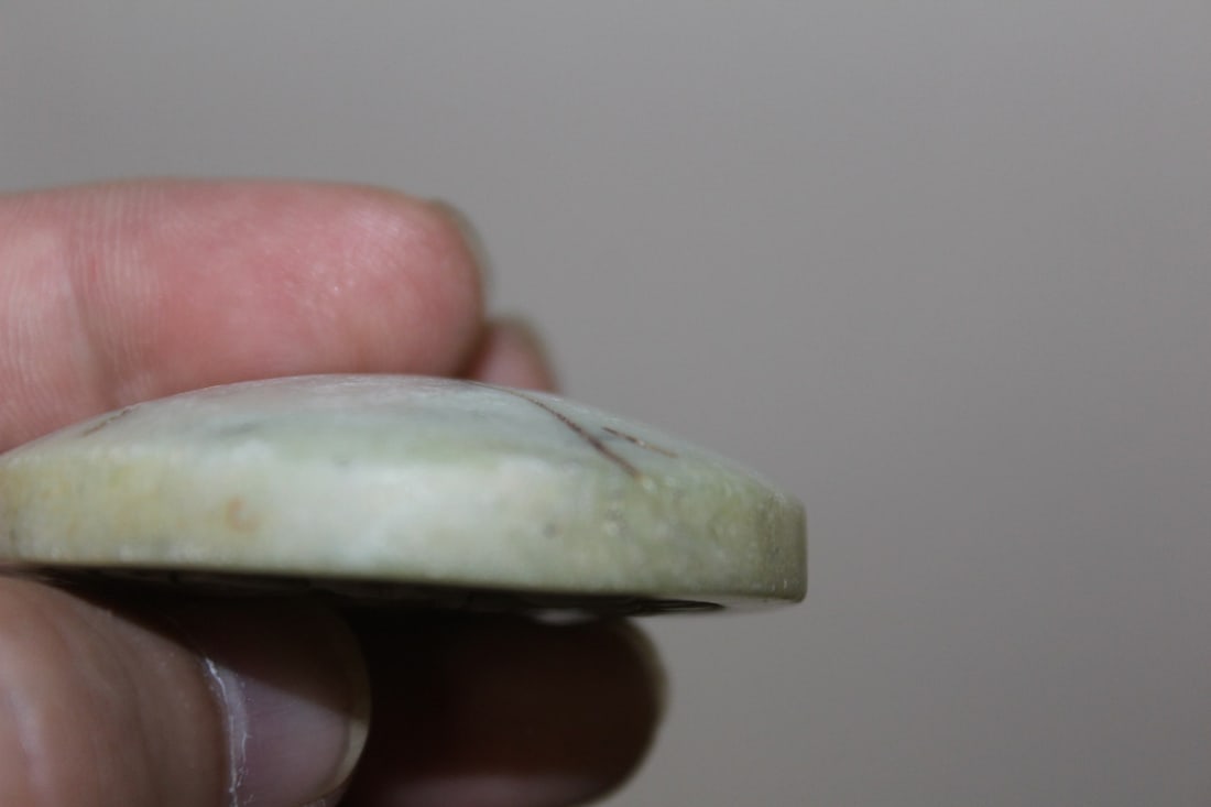 A Carved Jade or Similar Hardstone Disc - 3