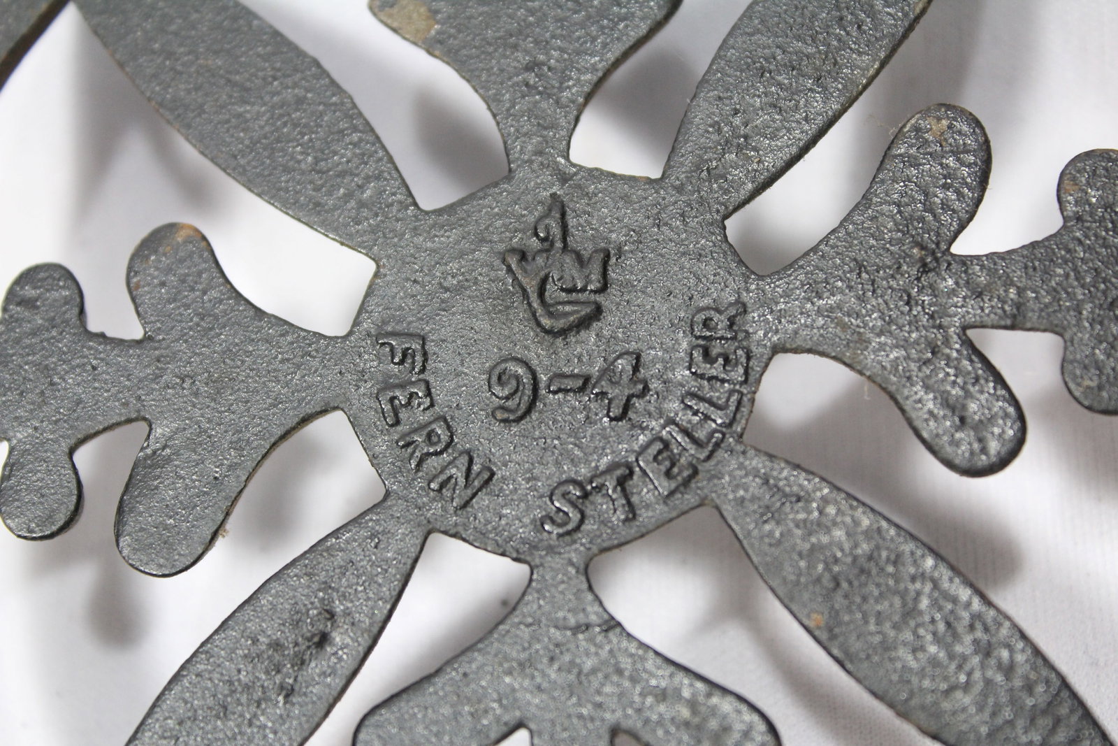 A Cast Iron Trivet - 4