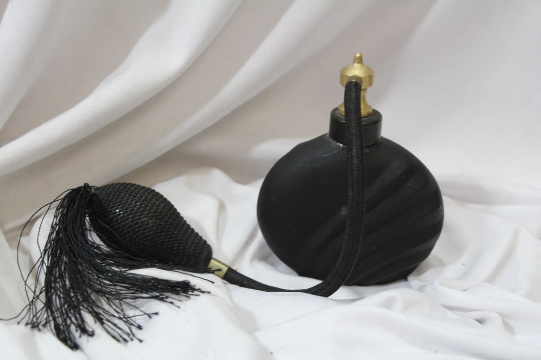 A Black Glass Parfume Bottle: with atomizer - 4 3/4" tall