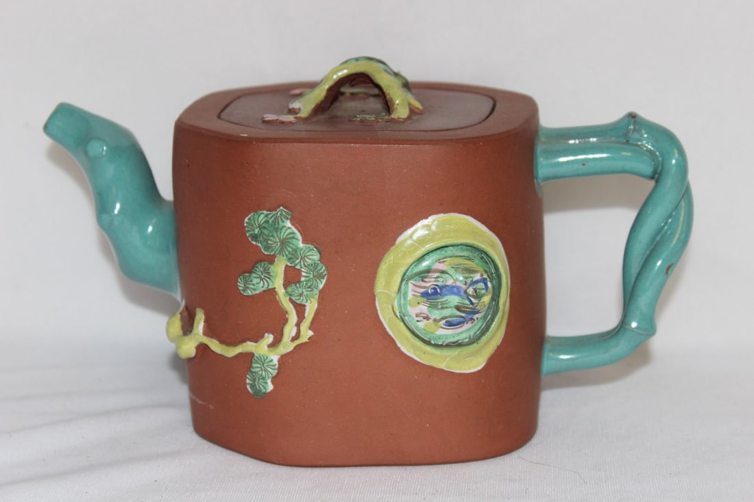 A Chinese Yixing Teapot: signed on the bottom and underneath the lid - 7 3/8" across