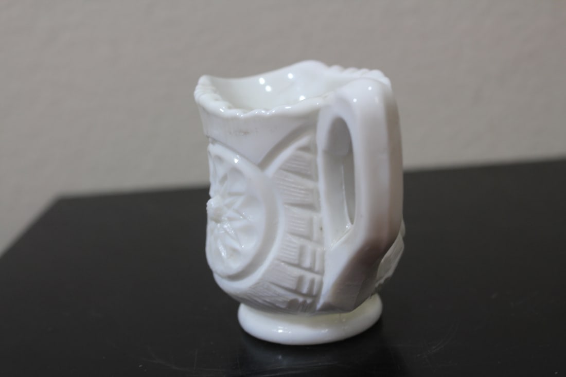 A Small Milk Glass Pitcher - 2