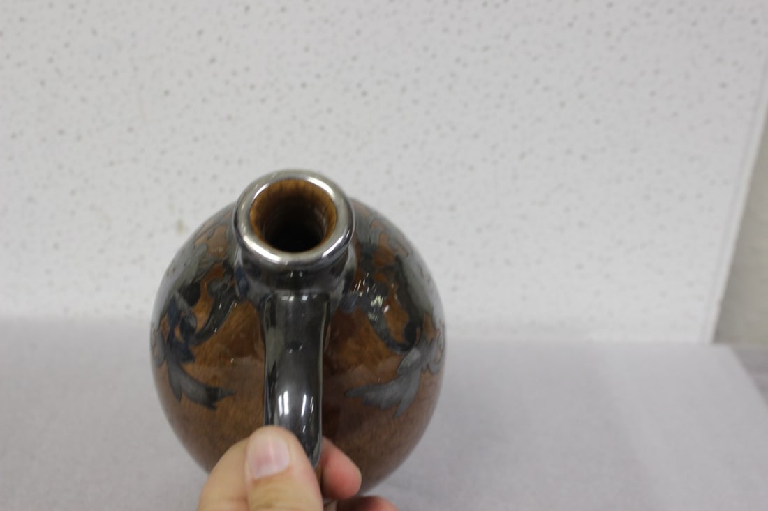 A vintage Sterling Overlay Musical Jug - 4