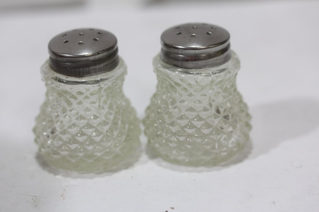 A Pair of Salt and Pepper Shakers - 2