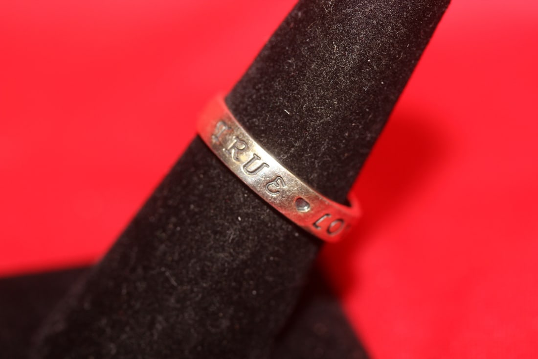 A Sterling Ring: Marked