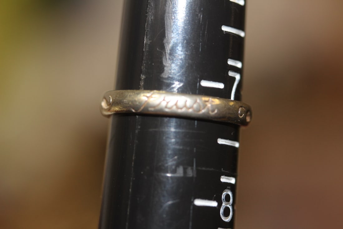 A Sterling Ring: Marked