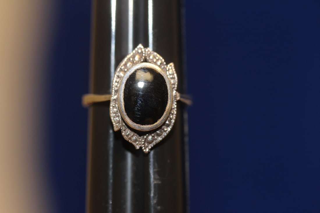 A Sterling and Onyx Ring: as shown