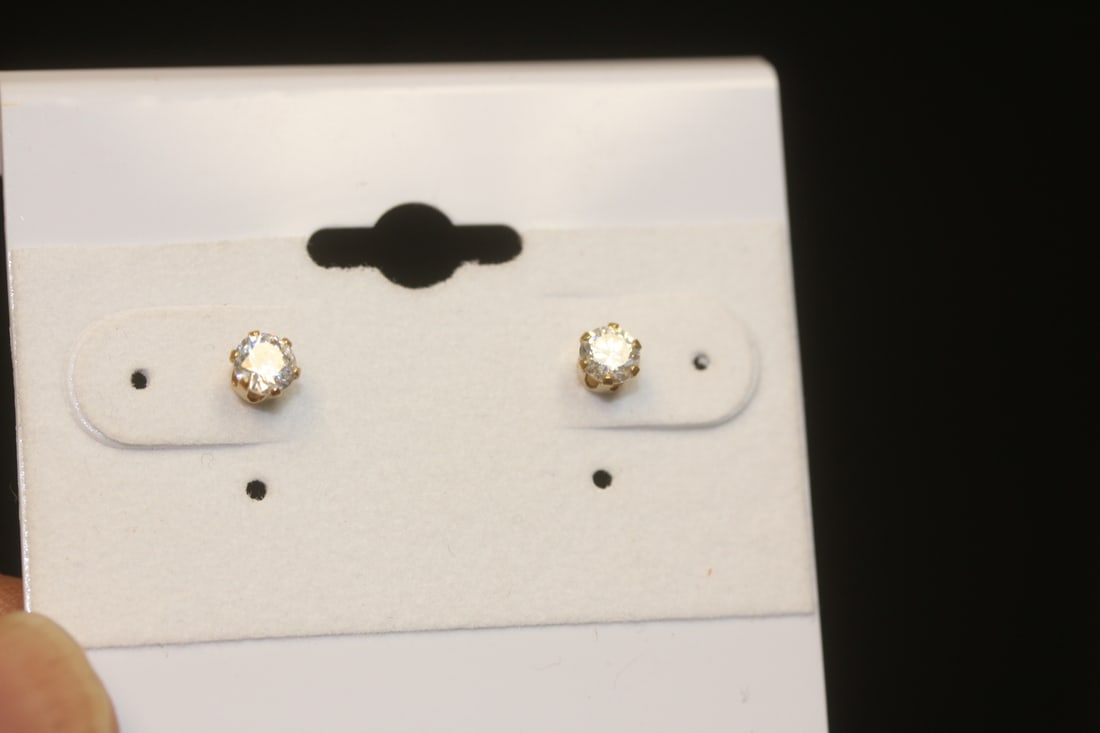10 Karat Gold and CZ Earrings: as shown