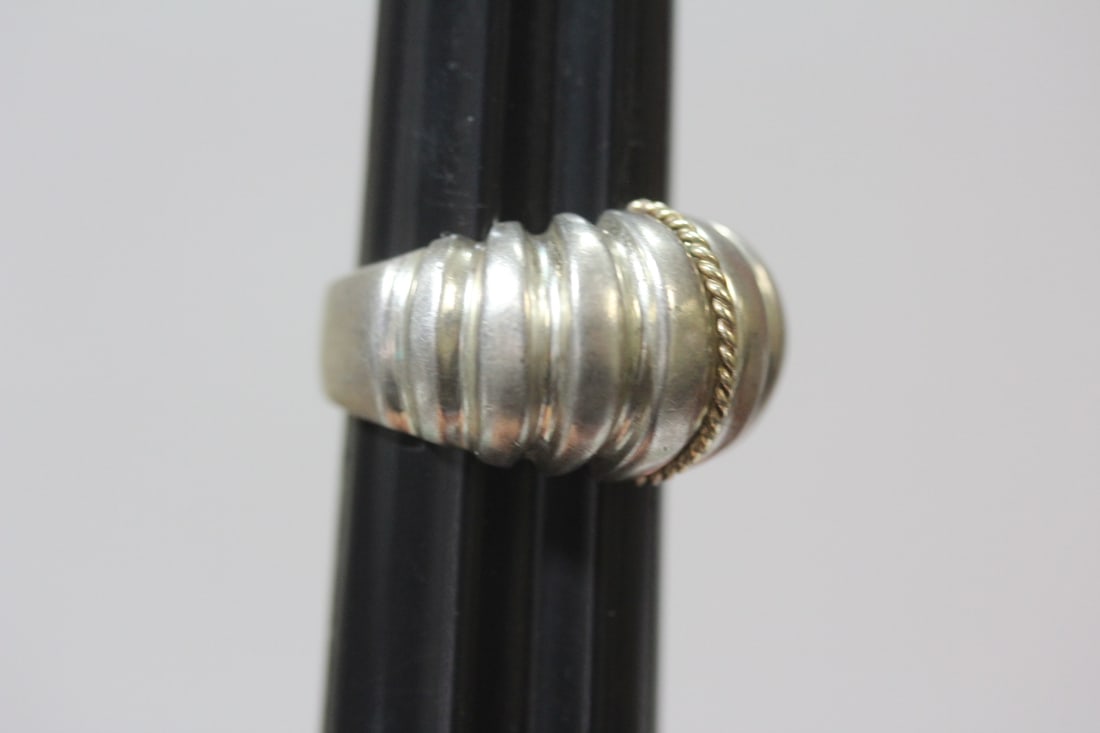 A Sterling and 14Karat Gold Ring: as shown on photos