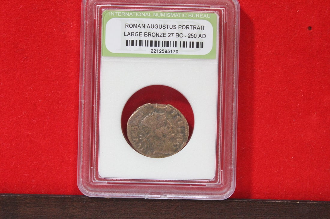 A Slabbed Large Bronze Roman Coin: Augustus portrait - 27 B.C. - 250 A.D.
