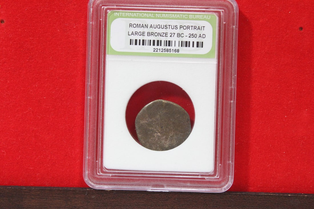 A Slabbed Large Bronze Roman Coin: Augustus portrait - 27 B.C. - 250 A.D.