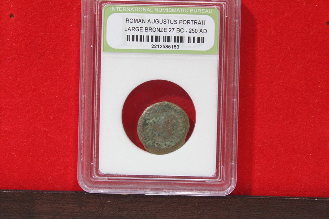 A Slabbed Large Bronze Roman Coin: Augustus portrait - 27 B.C. - 250 A.D.