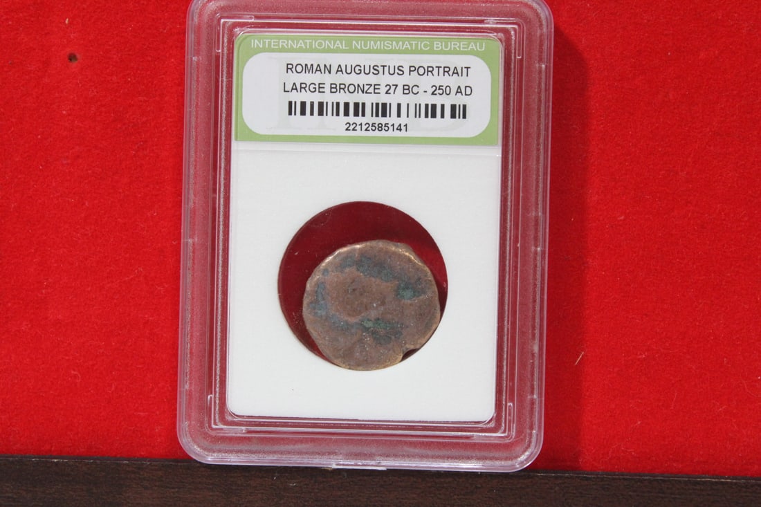 A Slabbed Large Bronze Roman Coin: Augustus portrait - 27 B.C. - 250 A.D.