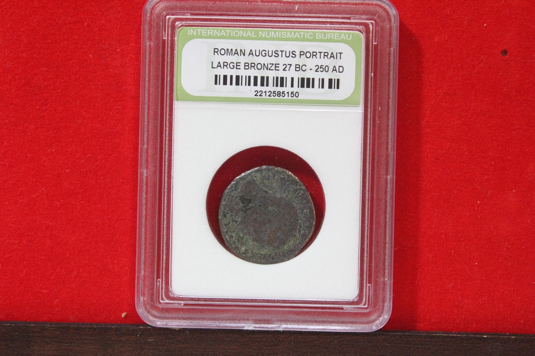 A Slabbed Large Bronze Roman Coin: Augustus portrait - 27 B.C. - 250 A.D.