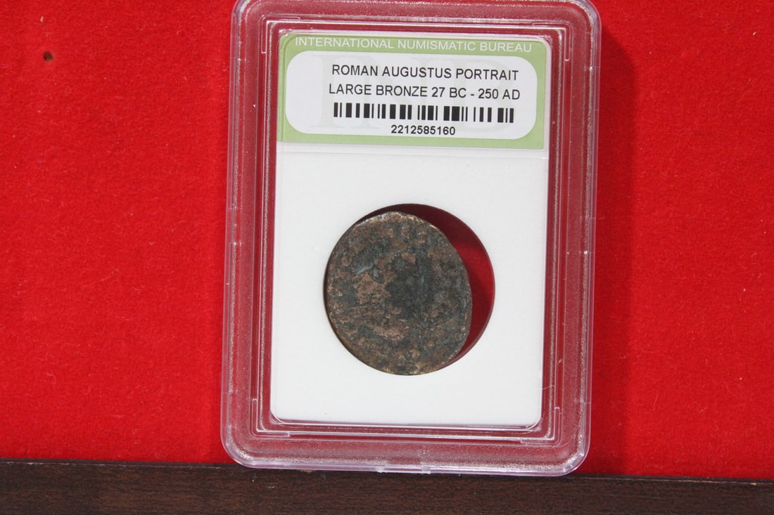 A Slabbed Large Bronze Roman Coin: Augustus portrait - 27 B.C. - 250 A.D.