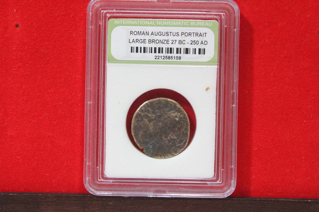 A Slabbed Large Bronze Roman Coin: Augustus portrait - 27 B.C. - 250 A.D.