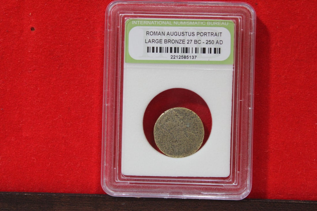 A Slabbed Large Bronze Roman Coin: Augustus portrait - 27 B.C. - 250 A.D.