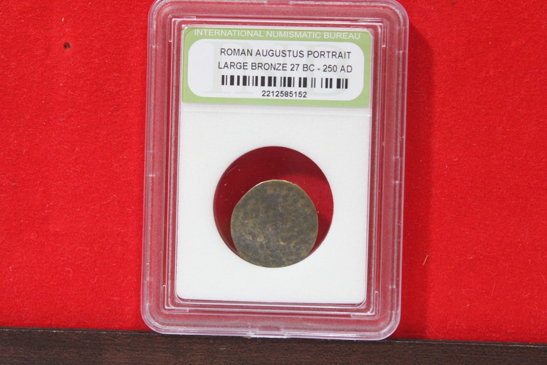 A Slabbed Large Bronze Roman Coin: Augustus portrait - 27 B.C. - 250 A.D.