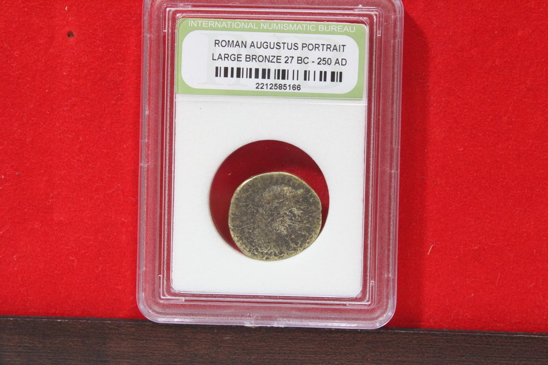 A Slabbed Large Bronze Roman Coin: Augustus portrait - 27 B.C. - 250 A.D.