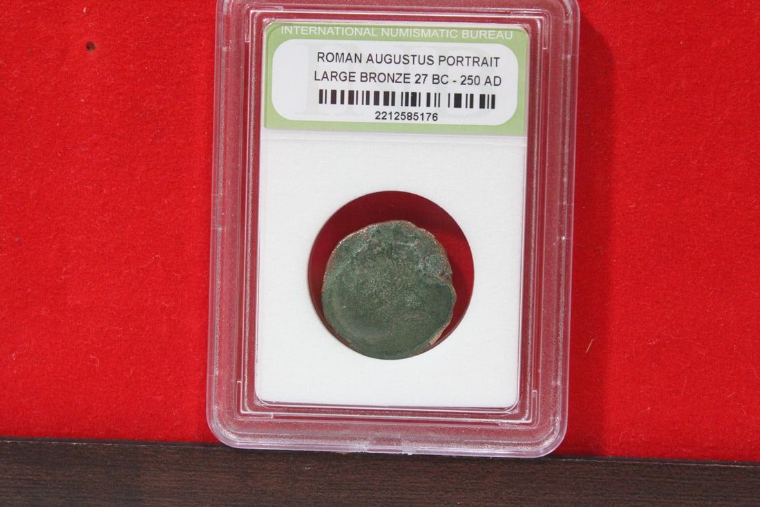 A Slabbed Large Bronze Roman Coin: Augustus portrait - 27 B.C. - 250 A.D.