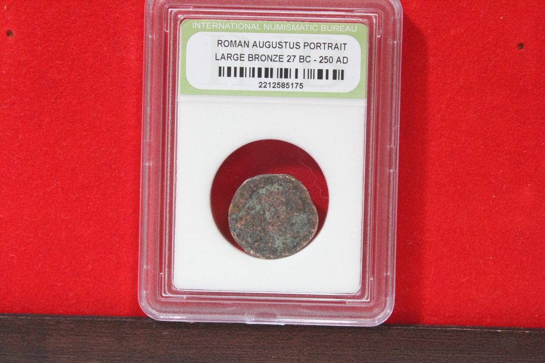 A Slabbed Large Bronze Roman Coin: Augustus portrait - 27 B.C. - 250 A.D.