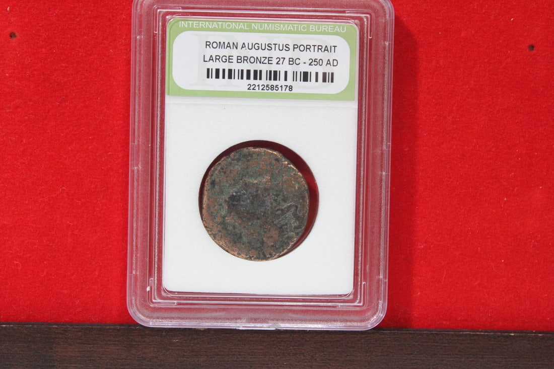A Slabbed Large Bronze Roman Coin: Augustus portrait - 27 B.C. - 250 A.D.