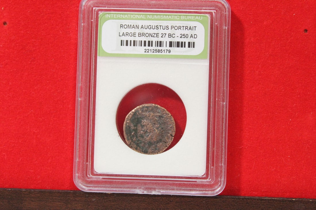 A Slabbed Large Bronze Roman Coin: Augustus portrait - 27 B.C. - 250 A.D.