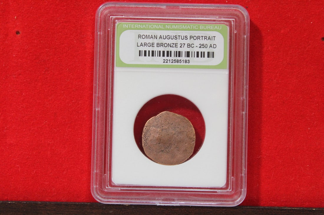A Slabbed Large Bronze Roman Coin: Augustus portrait - 27 B.C. - 250 A.D.