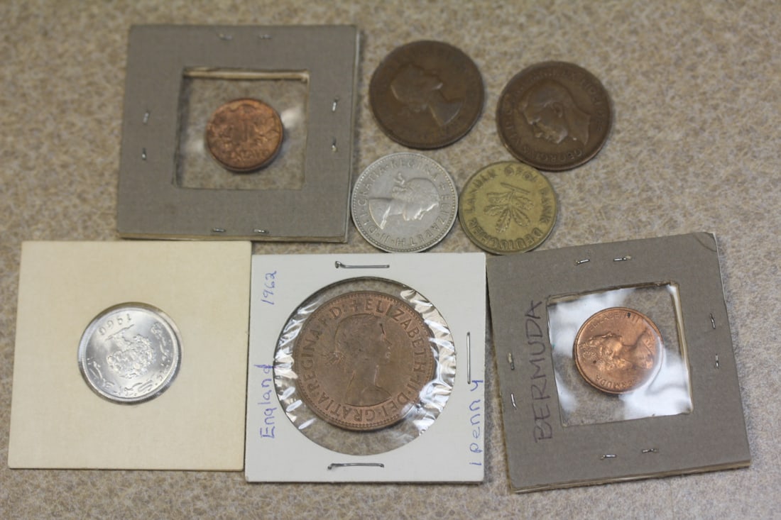 Lot of 8 foreign Coin: as shown