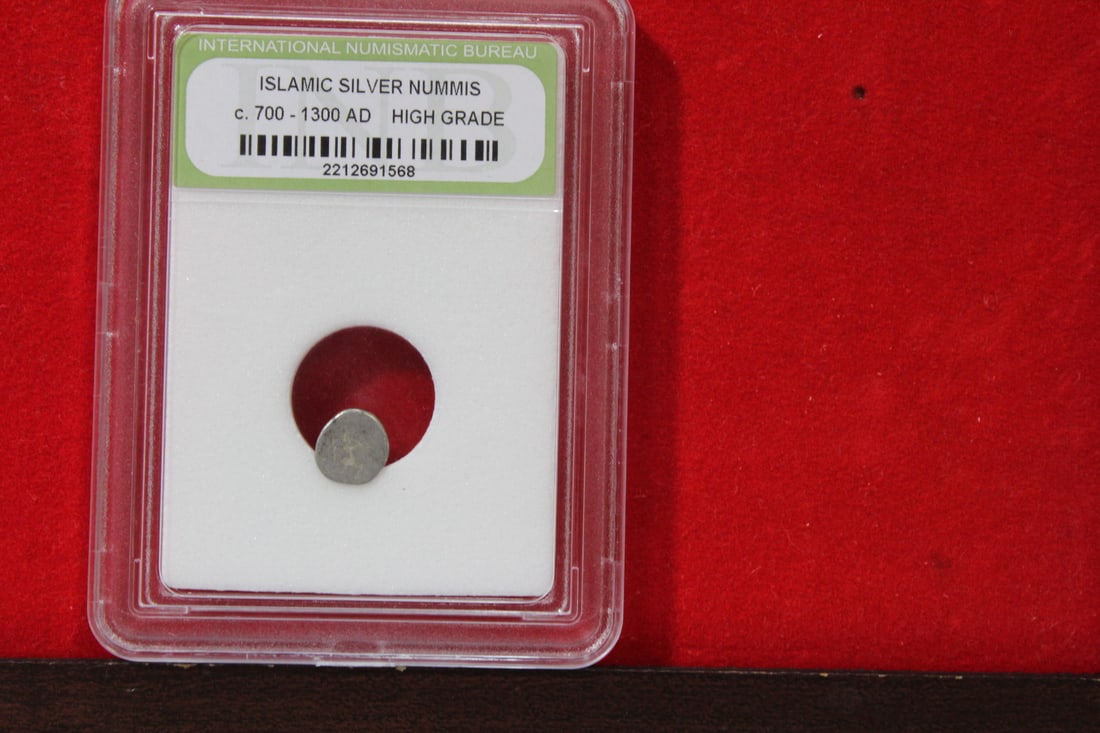 A Slabbed Islamic Silver Nummis: High Grade - c. 700 - 1300 A.D.