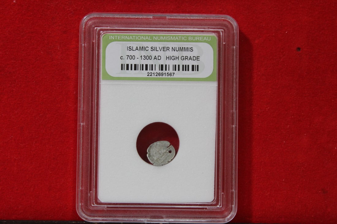 A Slabbed Islamic Silver Nummis: High Grade - c. 700 - 1300 A.D.